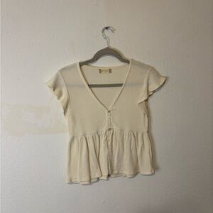 Cream Ribbed V-Neck Peplum Top